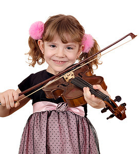 美丽的小女孩在小提琴上演奏音乐图片