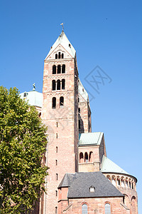 哥特教会建筑学钟楼教会绿色蓝色城市棕色天空建筑石头图片