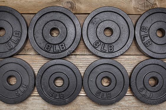 健康体重哑铃重量木头甲板盘子健身房黑色体育器材锻炼图片