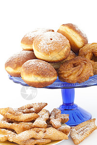 甜甜圈和糕饼草蛋糕食物圆形糕点吸管盘子图片