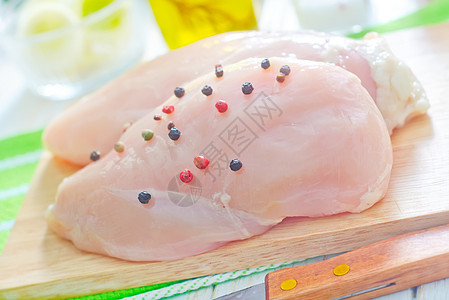 鸡片食品胸肉蓝色火鸡鱼片饮食胸部木头桌布草药图片