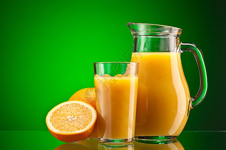 橙汁过绿色甜点液体投手食物黄色水果果汁玻璃橙子图片