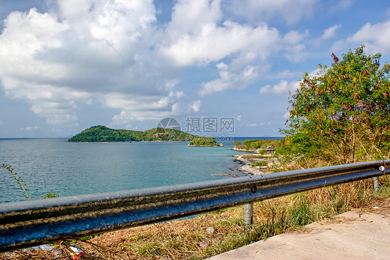 在泰国海滩的沙滩上海岸反射日落热带季节晴天薄雾岩石海浪石头图片