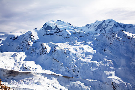 冬季风景天空太阳冰川晴天地形顶峰岩石蓝色地标高度图片