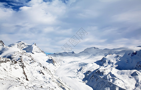 冬季雪山旅游高度天空地标岩石顶峰地形假期晴天太阳图片