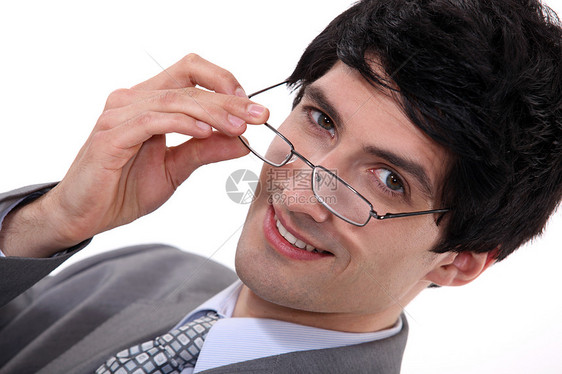 商务人士对着他的眼镜看白色手表镜片框架男人眼睛鹰眼人士黑色商业图片