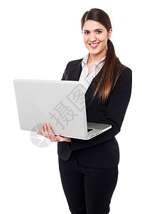 以笔记本电脑装扮的正正规女青年老板快乐工作微笑公司技术管理人员商务人士女士图片