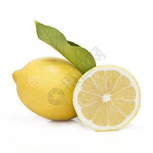 切一个柠檬半水果果汁饮食黄色树叶白色静物蔬菜营养绿色图片