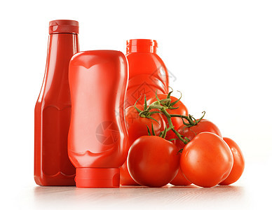 含番茄酱和白色分离的新鲜西红柿酱汁肉汁瓶子蔬菜桌子红色厨房塑料香料盘子图片