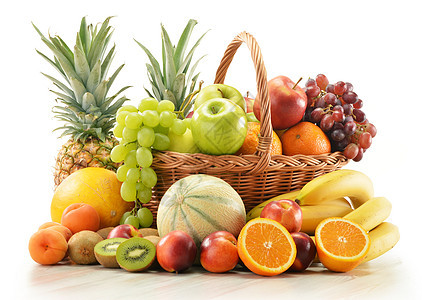 以各种水果组成 在柳篮中植物奇异果白色油桃橙子篮子香蕉菠萝热带柳条图片