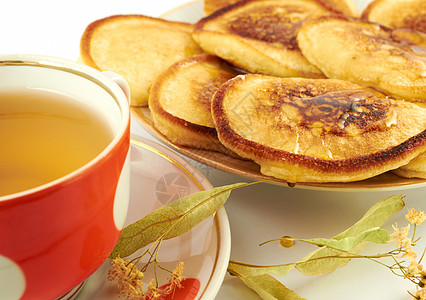 煎饼甜点蜂蜜飞碟茶具植物杯子食物油炸早餐面粉图片