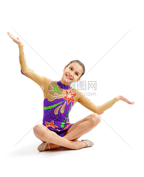 年轻女子体操运动员力量训练女性运动微笑生活方式服装紫色女孩健身房图片