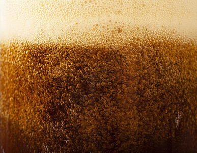 啤酒背景宏观啤酒厂饮料泡沫金子食物玻璃气泡酒精液体图片