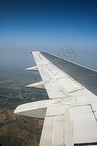 飞机飞行翅膀蓝色场地技术假期天气地形旅行窗户地球图片