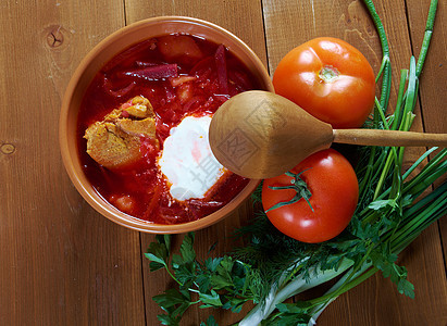 红菜汤borscht午餐美食洋葱奶油盘子绿色蔬菜红色食物香料图片