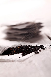 木质表面的茶袋绳索茶点茶包标签植物味道早餐草本植物时间工作室图片