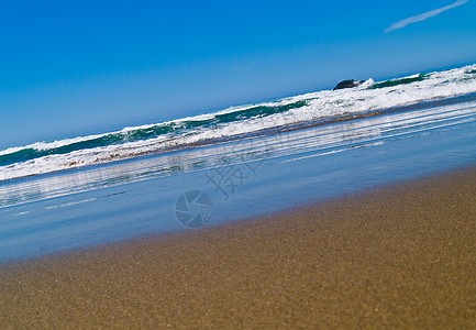 俄勒冈海岸的海滩石头海岸碰撞明信片太阳墙纸全景旅游悬崖游客图片