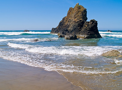 俄勒冈海岸的海滩旅游太阳海洋石头场景支撑海岸线晴天岩石季节图片