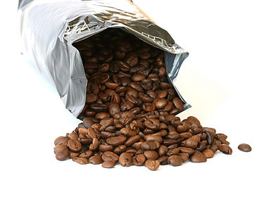 白色背景的全咖啡豆咖啡店警察水平包装豆子图片