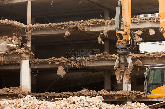 销毁装有设备的混凝土建筑破坏机械房子垃圾损害碎片灾难瓦砾工作住宅图片