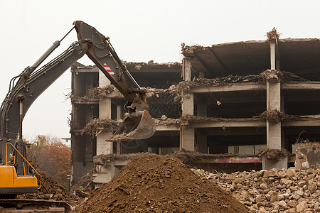 销毁装有设备的混凝土建筑灾难拆除垃圾损害瓦砾破坏城市进步工作替代品图片