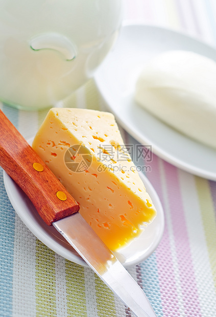 白色盘子上的新鲜奶酪小吃烹饪宏观文化美食熟食营养团体产品润滑脂图片