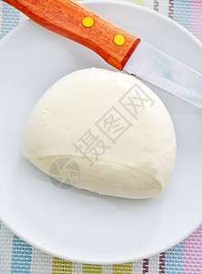 白色盘子上的新鲜奶酪熟食午餐美味饮食奶制品营养羊乳美食宏观食物图片