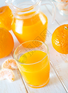 橘子汁果汁小吃投手饮料橙子农业热带饮食叶子茶点背景图片