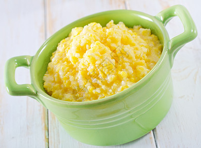 玉米粥营养粒子玉米谷物勺子流行音乐桌子早餐稀饭粮食图片