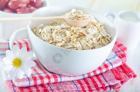 Oat 薄片水果麦片勺子活力小麦餐巾稀饭粮食种子饮食图片