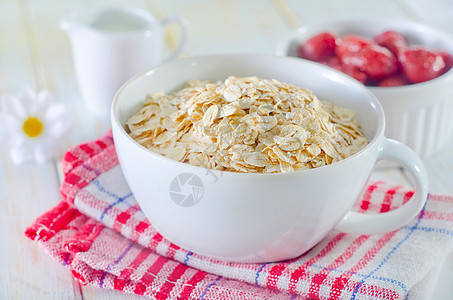 Oat 薄片产品餐巾早餐饮食玻璃营养桌子小麦粮食食物图片