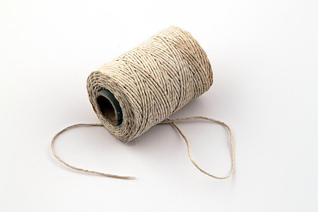 字符串或麻线的球绑定白色线圈主轴绳索绑扎细绳缠绕力量棉布图片