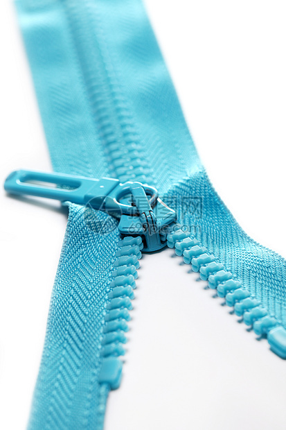 近距离拍摄蓝色拉链白色紧固件装饰纺织品压缩安全扣子金属联盟风格图片