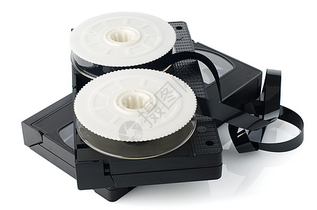 两盘录影带和胶卷录像带数据磁带光盘视频电影录像机白色技术贮存图片