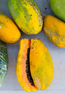 木薯热带水果橙子生产食物农产品农贸市场种子黄色绿色木瓜市场图片