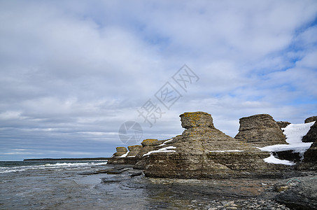 岩石构造海岸太阳悬崖编队旅游天空海岸线风景灰色石头图片