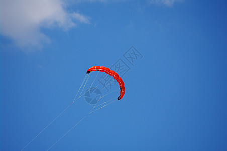 Kite 天空飞翔橙子波浪海滩空气运动享受细绳消遣尾巴力量图片