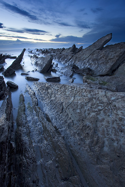 西班牙巴斯克州比兹卡亚巴里卡海滩地区天空岩石蓝色海滩布里科石头海洋日落图片
