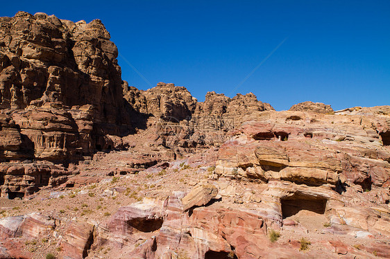 约旦佩特拉的景观宝藏雕刻文化历史历史性遗产沙漠岩石红色砂岩图片