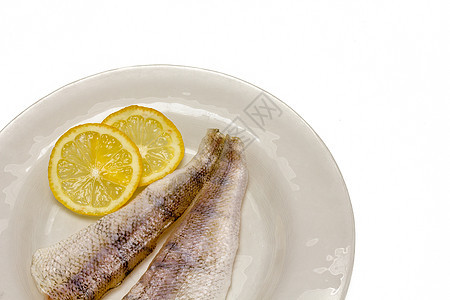 原鱼肉多莉白色草本植物食物鲶鱼烹饪柠檬美食健康鱼片图片