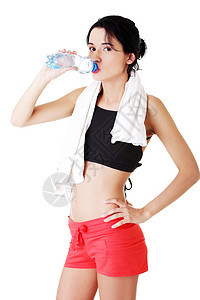 年轻健康妇女饮用矿泉水女性微笑饮食保健黑发运动员蓝色卫生液体矿物图片