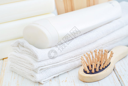 毛巾和洗发水洗剂液体温泉产品兰花润肤治疗花朵化妆品奶油图片