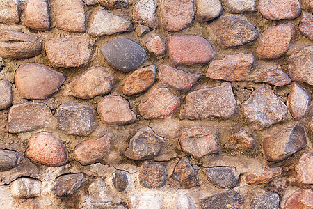 从旧历史古墙上用石头建起的隔离墙房子建筑砖墙材料黏土墙纸石膏水泥风格石墙图片
