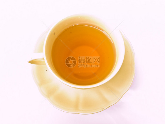 一杯茶 用白色背景隔绝的花粉形态玻璃时间饮料草本盘子棕色花朵液体早餐杯子图片