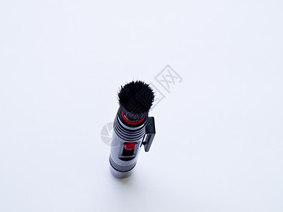 在白色背景上隔离的窗帘乐器红色镜片灰尘便利刷子口袋镜头相机光学图片
