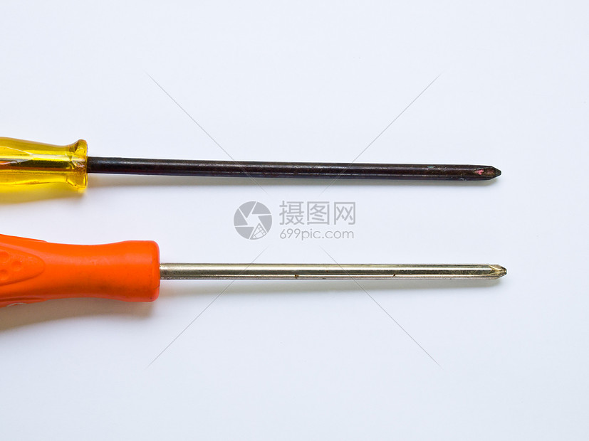 用过的螺旋桨在白色背景上隔离构造硬件螺丝刀塑料工具金属维修橙子工业合金图片