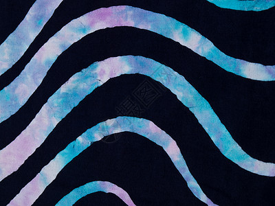 黑织物Batik作为背景的多彩图案白色墙纸漩涡蓝色黑色艺术品棉布纺织品螺旋蜡染图片