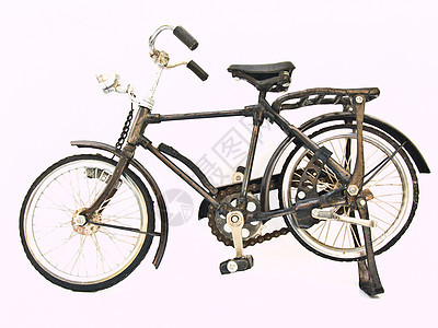 白色背景孤立的钢铁自行车模型Name车辆旅行运输金属生态环境篮子乐趣齿轮古董图片