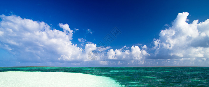 海滩沙滩旅行天堂海洋海浪太阳支撑蓝色假期阳光天空图片