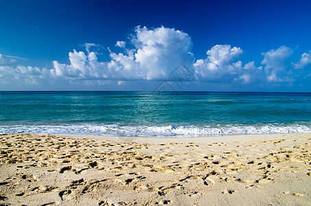 海滩沙滩海浪支撑海岸海洋旅行天堂阳光天空热带假期图片